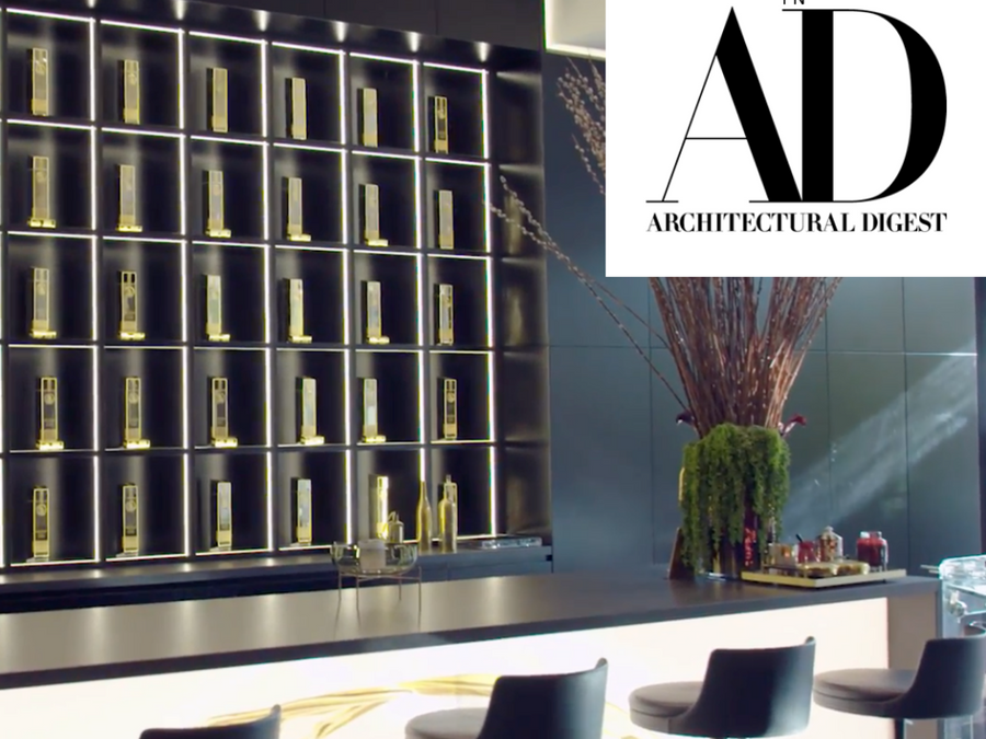 Check out what this Hollywood home owner does with 50 GOLD BAR Whiskey Bottles!