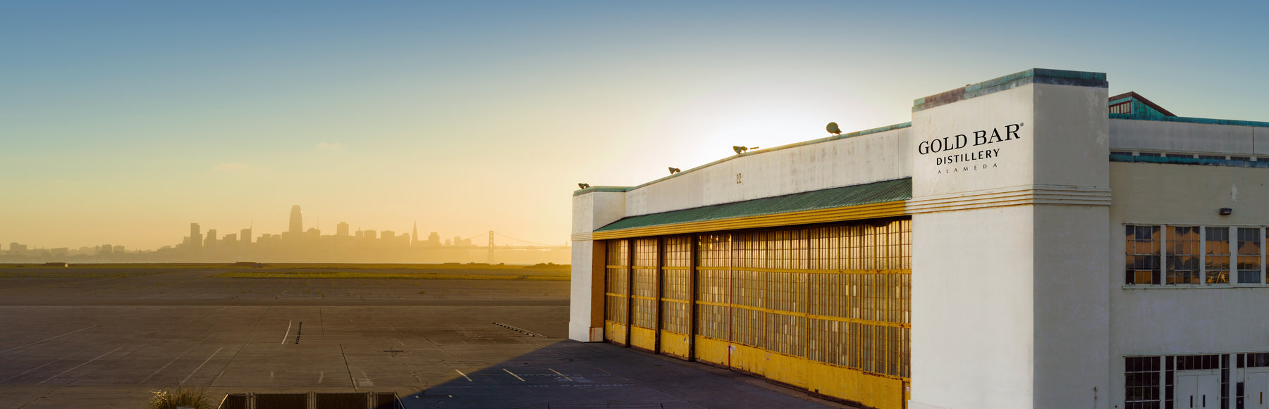 Gold Bar Distillery - Alameda waterfront venue with San Francisco skyline